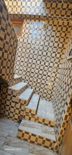 an overhead view of a brick wall with stairs at Ashraf Hostel Guest house in Aswan