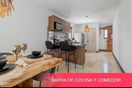 a kitchen with a wooden table in a room at Luxury home in San Miguel Allende in San Miguel de Allende