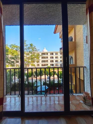 Ein Balkon oder eine Terrasse in der Unterkunft Yoo' Bichu' Condo Tangolunda
