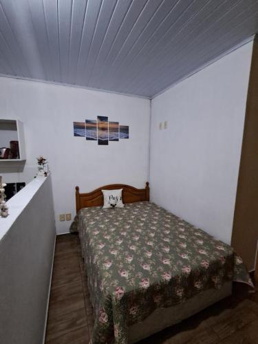 Ένα ή περισσότερα κρεβάτια σε δωμάτιο στο Apartamento 1 dormitório Rio vermelho