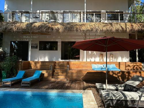 Φωτογραφία από το άλμπουμ του La Sana Surf Hotel, New management, Few mn drive to the beach σε Santa Teresa Beach