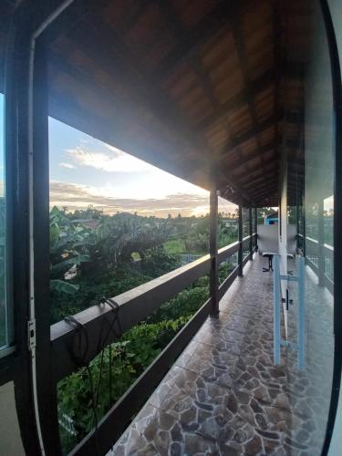 Balkoni atau teres di Casa de praia com jacuzzi