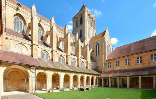 a large building with a tower and a church at 4 Bedroom Gorgeous Home In Valorbiquet in Saint-Julien-de-Mailloc