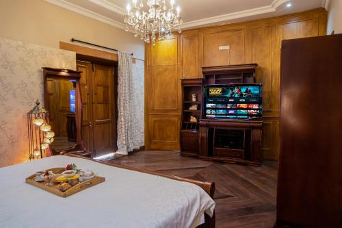 Ein Bett oder Betten in einem Zimmer der Unterkunft Hotel Boutique Casa Ruth en Cuenca