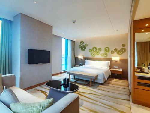 TV a/nebo společenská místnost v ubytování Holiday Inn Chengdu Qinhuang by IHG