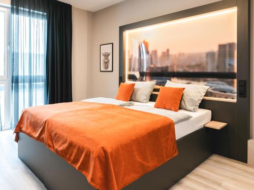 Postel nebo postele na pokoji v ubytování JustStay München Hotel & Apartments