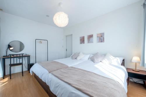 En eller flere senge i et værelse på Villa RIKUNOYA SUZUKA