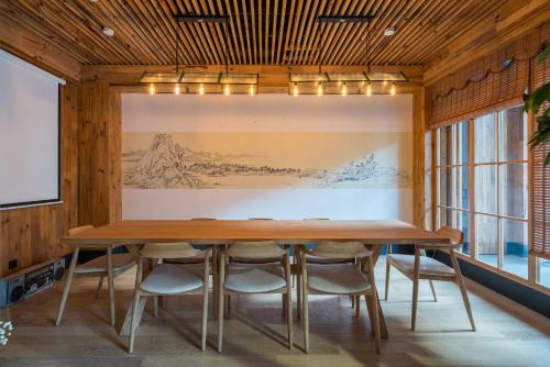 Fotografie z fotogalerie ubytování Kaichen Puju Hot Spring Village Resort Hotel v destinaci Deqing