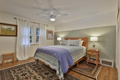 a bedroom with a bed and a ceiling fan at Susan Lane Hideaway - 4BR, 3BA Renovated Home, Close to Skiing and Town, Fireplace in Rutland