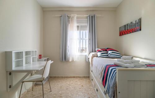 Ένα ή περισσότερα κρεβάτια σε δωμάτιο στο 3 Bedroom Nice Home In Salteras