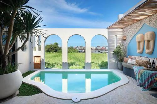 Kolam renang di atau dekat dengan Tranquil Ricefields View Villa