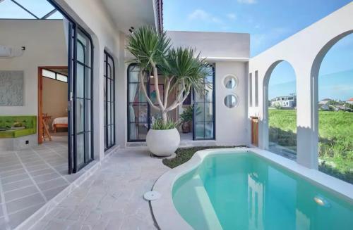 Kolam renang di atau dekat dengan Tranquil Ricefields View Villa