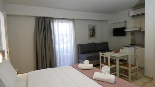 Postel nebo postele na pokoji v ubytování Melina Beach
