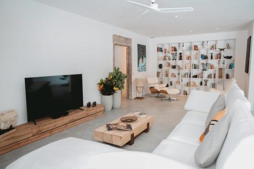 Televiisor ja/või meelelahutuskeskus majutusasutuses The Oasis Residence