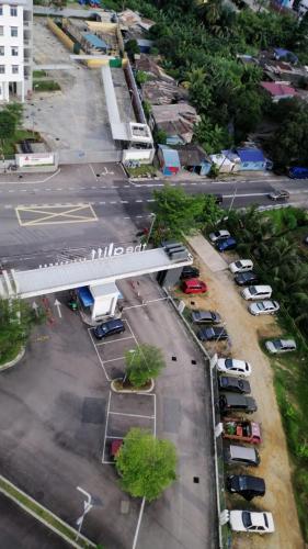 an aerial view of a parking lot with parked cars at The Aliff Residences in Johor Bahru