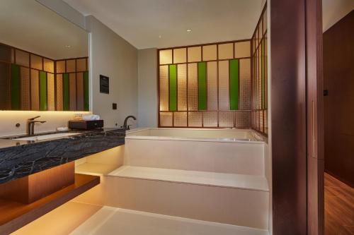 Ένα μπάνιο στο Guangdong Hot Spring Hotel
