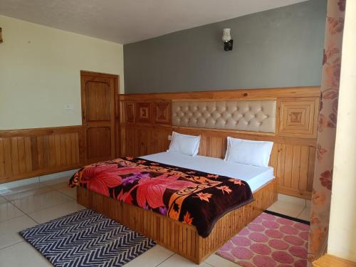 Ένα ή περισσότερα κρεβάτια σε δωμάτιο στο Leela Home - Full Mountain View