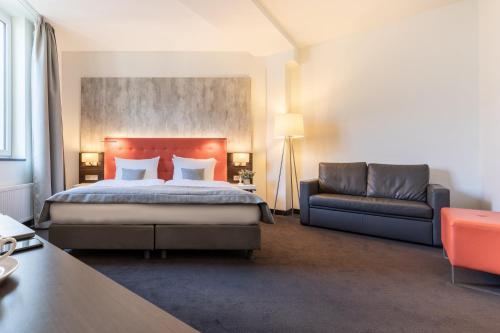 Postel nebo postele na pokoji v ubytování Garner Hotel Berlin - Mitte by IHG