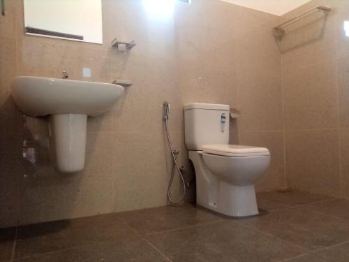 Salle de bains dans l'établissement Minara Guest House