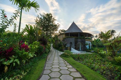 a path leading to a house with a gazebo at The Wapa Lux Tent in Sidemen