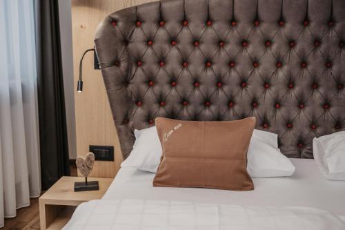 Postel nebo postele na pokoji v ubytování Freina Mountain Lifestyle Hotel