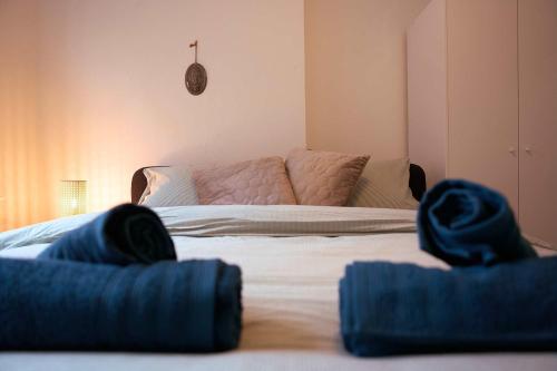 a bedroom with a bed and a couch at City Suite Number 4 in Eindhoven