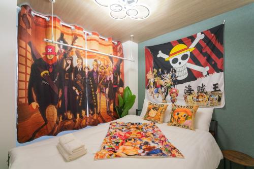 a bedroom with a bed with a painting on the wall at フォルモント寺田町204 in Osaka