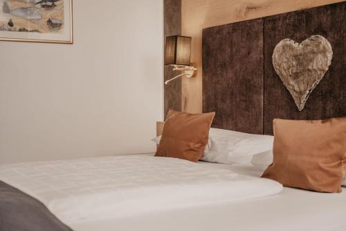 Postel nebo postele na pokoji v ubytování Freina Mountain Lifestyle Hotel