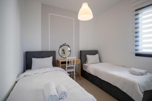 Postel nebo postele na pokoji v ubytování Deluxe Two Bedroom Apartment in Caesar Resort & SPA, Long Beach