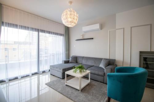 Posezení v ubytování Deluxe Two Bedroom Apartment in Caesar Resort & SPA, Long Beach