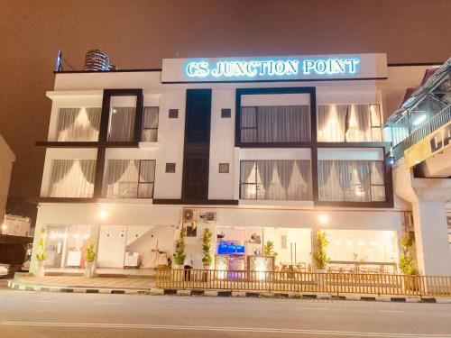 a building with a question point sign on the side of it at CS Junction Point - Double Deluxe Room - DDR in Kuala Pilah