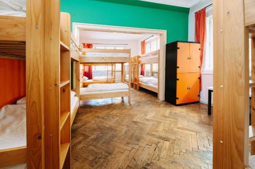 Postel nebo postele na pokoji v ubytování Benedikt City Center Hostel