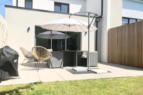Kawasan patio atau luaran di Jolie maison récente Ultra Cosy Bord de mer