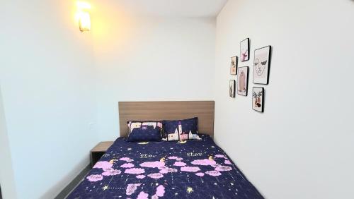 Postel nebo postele na pokoji v ubytování Ruby Sun Home 1