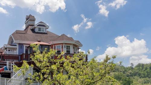 a large house sitting on top of a hill at Gyeongju Finrandia Pension in Gyeongju