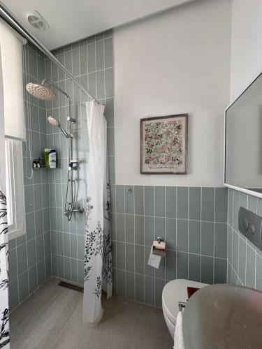 a bathroom with a shower and a sink at Levant Company Pension de Luxe in Istanbul