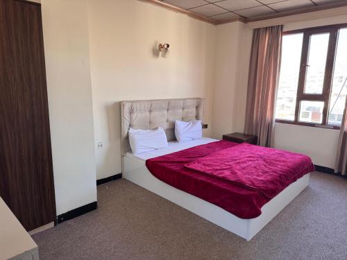 Postel nebo postele na pokoji v ubytování Nasim hotel