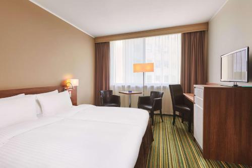 Кровать или кровати в номере Radisson Blu Szczecin