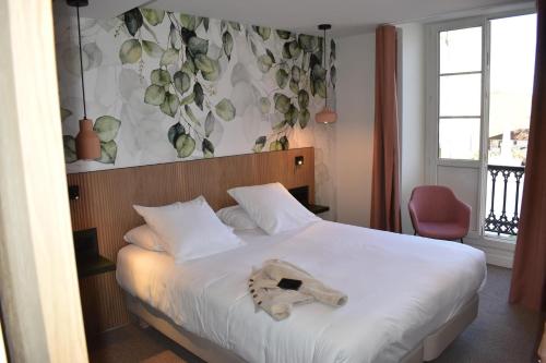 Postel nebo postele na pokoji v ubytování Hotel Les Tilleuls