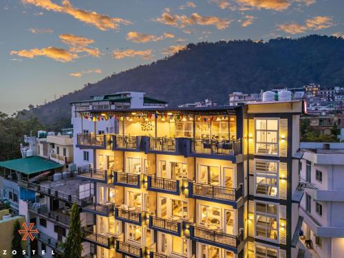 a building with lights on top of it at Zostel Rishikesh, Tapovan in Rishīkesh