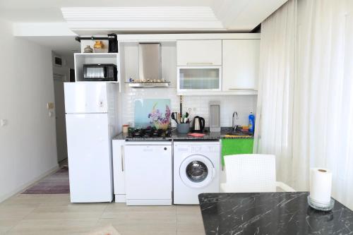 Kuchyň nebo kuchyňský kout v ubytování Marka Suites Comfort