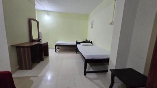 Ένα ή περισσότερα κρεβάτια σε δωμάτιο στο Casa guest house