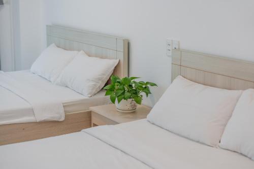 Postel nebo postele na pokoji v ubytování Red Coral Hotel