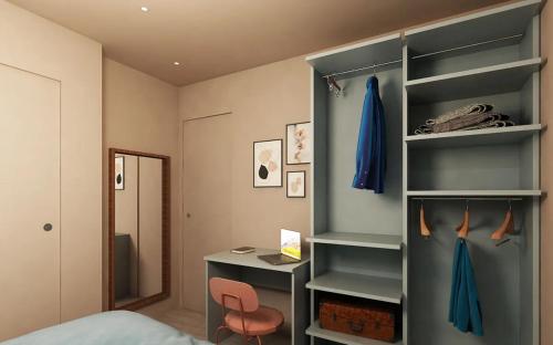 a bedroom with a bed and a desk and a shelf at Camping Union Lido in Cavallino-Treporti