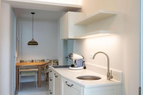 Η κουζίνα ή μικρή κουζίνα στο Prokopios Beach House