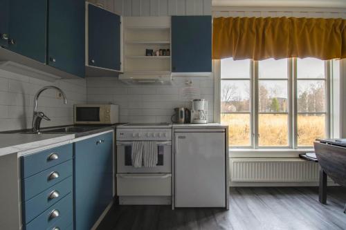 Kuchyň nebo kuchyňský kout v ubytování Gästis Lodge Vemdalen