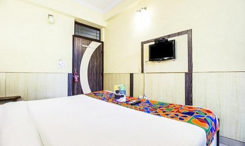 Un ou plusieurs lits dans un hébergement de l'établissement Hotel Golden Heritage Deluxe