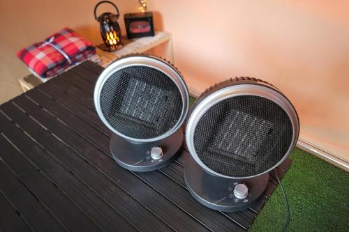 two metal containers sitting on top of a table at Bosco Glamping Partyroom Juan in Incheon