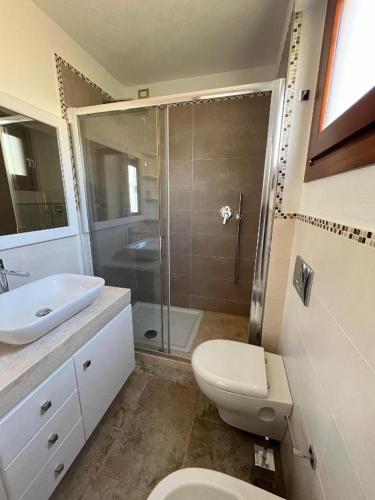 Koupelna v ubytování Attico Via Roma Villasimius