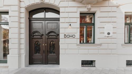 a brown door on the side of a building at BoHo Hotel Budapest - Small Luxury Hotels in Budapest